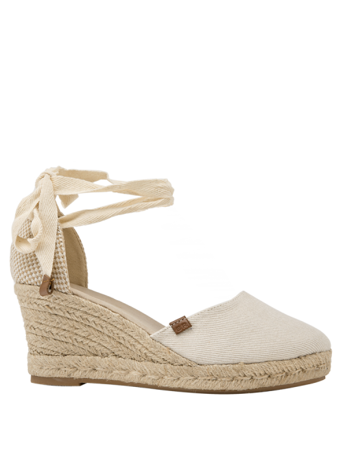 Alpargata beige mujer con cuña, diseño clásico y cintas al tobillo, ideal para estilo boho-chic.